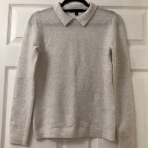 Very light gray sweater